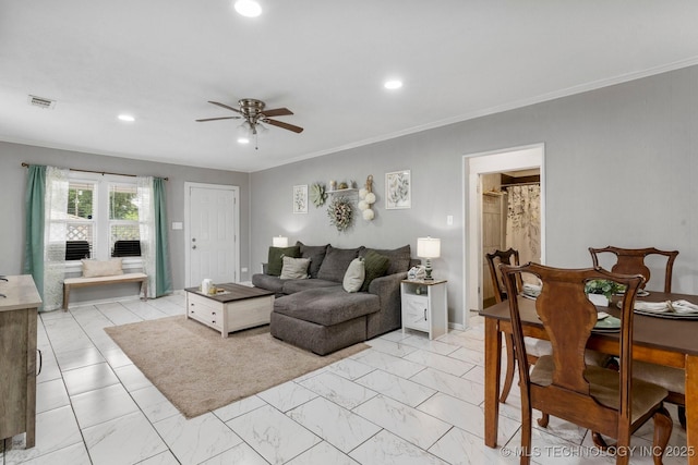 4844 S 30th Ave W, Tulsa, OK 74107 - living room featuring a ceiling fan, recessed lighting, light marble finish floors, and crown molding