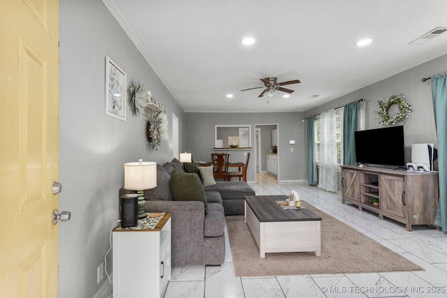4844 S 30th Ave W, Tulsa, OK 74107 - living room featuring ornamental molding, recessed lighting, a ceiling fan, and light marble finish flooring