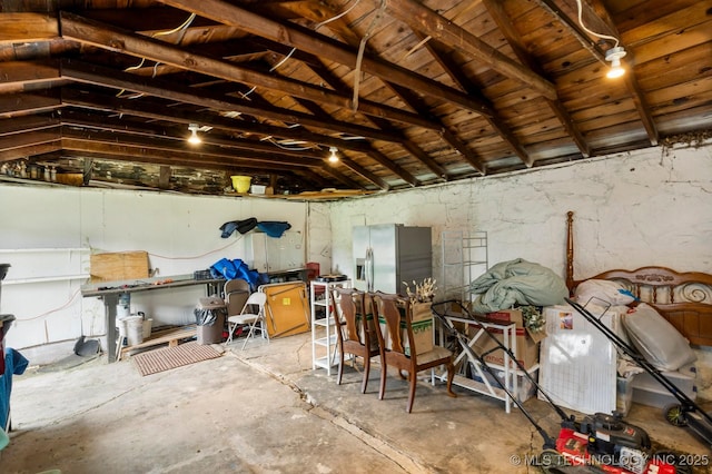 4844 S 30th Ave W, Tulsa, OK 74107 - garage with stainless steel refrigerator with ice dispenser and wooden ceiling