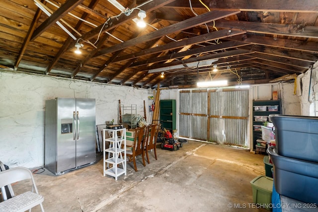 4844 S 30th Ave W, Tulsa, OK 74107 - garage with stainless steel refrigerator with ice dispenser