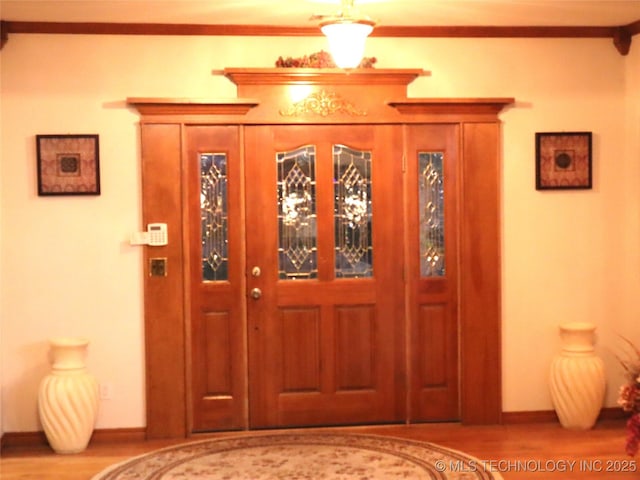 7054 E 149th St, Collinsville, OK 74021 - entrance foyer featuring wood finished floors and baseboards