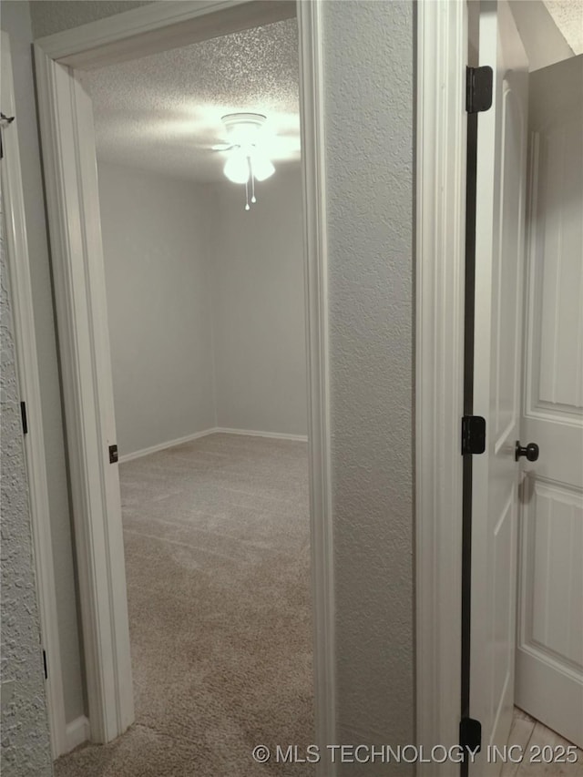 804 W Glendale St, Broken Arrow, OK 74011 - hall featuring a textured ceiling, carpet flooring, and a textured wall
