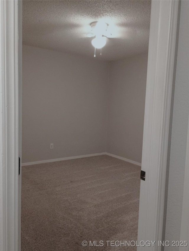 804 W Glendale St, Broken Arrow, OK 74011 - carpeted empty room featuring a textured ceiling