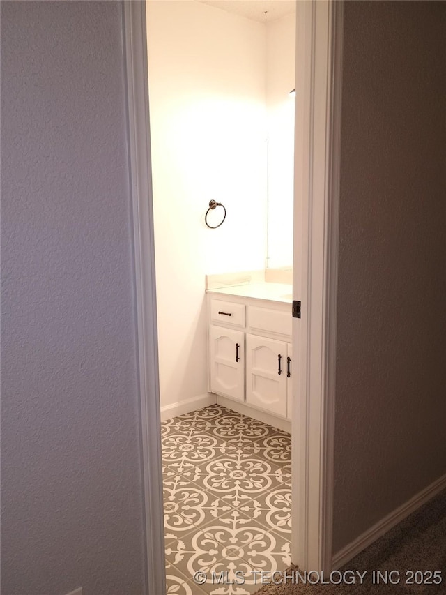 804 W Glendale St, Broken Arrow, OK 74011 - bathroom with vanity and baseboards