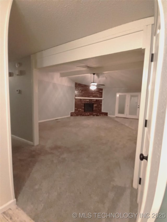 804 W Glendale St, Broken Arrow, OK 74011 - unfurnished living room featuring a fireplace and carpet flooring