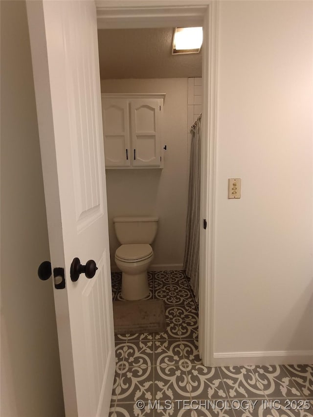 804 W Glendale St, Broken Arrow, OK 74011 - bathroom featuring tile patterned flooring and a shower with shower curtain