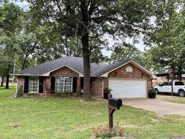 417292 E 1145th Rd, Eufaula, OK 74432 - single story home with a garage, roof with shingles, concrete driveway, and brick siding