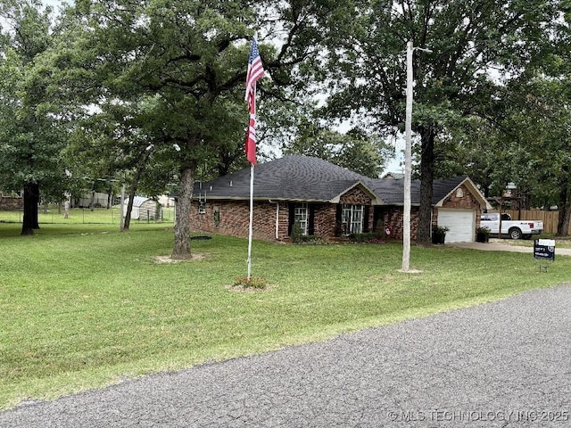 417292 E 1145th Rd, Eufaula, OK 74432 - ranch-style house featuring an attached garage, a shingled roof, and concrete driveway