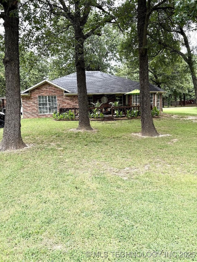 417292 E 1145th Rd, Eufaula, OK 74432 - ranch-style home with a front yard, brick siding, and roof with shingles