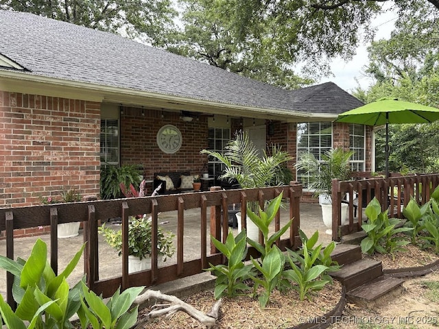 417292 E 1145th Rd, Eufaula, OK 74432 - view of front of house with brick siding and roof with shingles