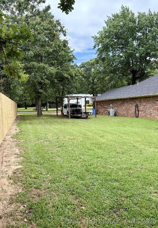 417292 E 1145th Rd, Eufaula, OK 74432 - view of yard featuring a pergola and a carport