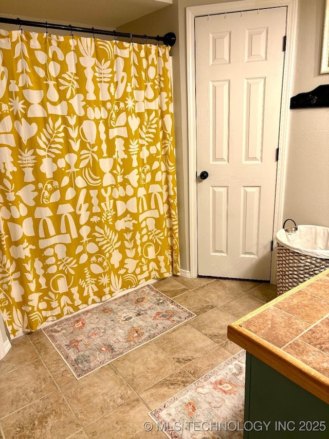 417292 E 1145th Rd, Eufaula, OK 74432 - bathroom with vanity and a shower with shower curtain