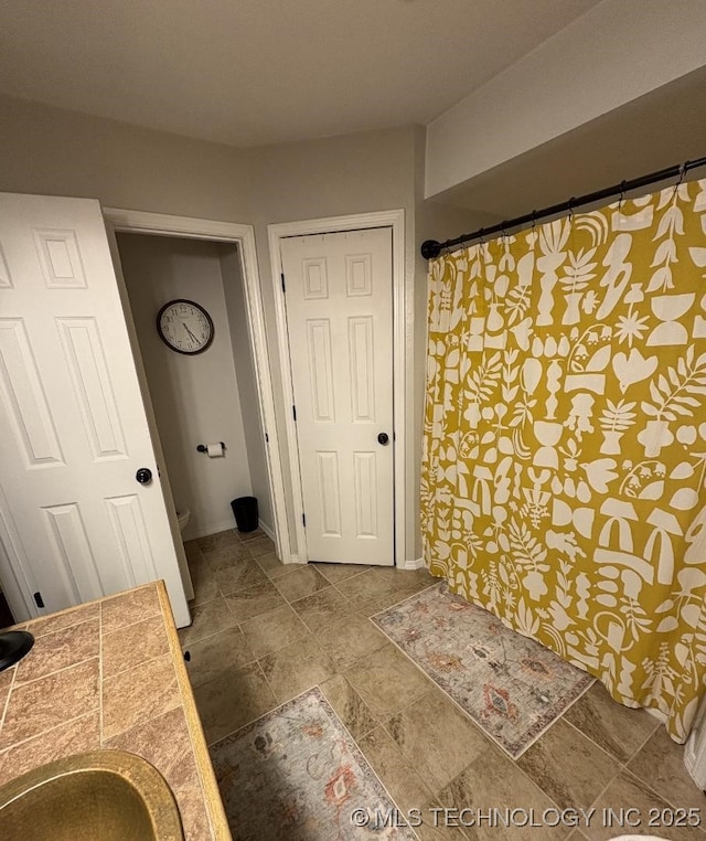 417292 E 1145th Rd, Eufaula, OK 74432 - full bathroom with vanity and curtained shower