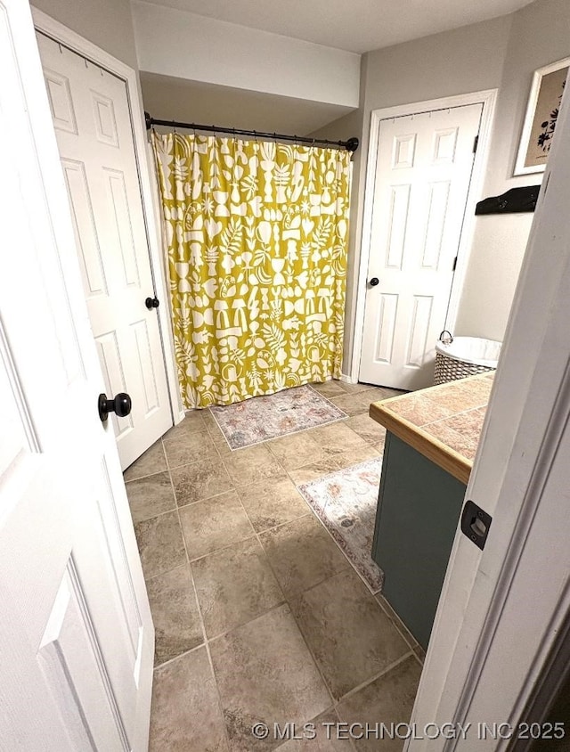 417292 E 1145th Rd, Eufaula, OK 74432 - bathroom with vanity and a shower with shower curtain