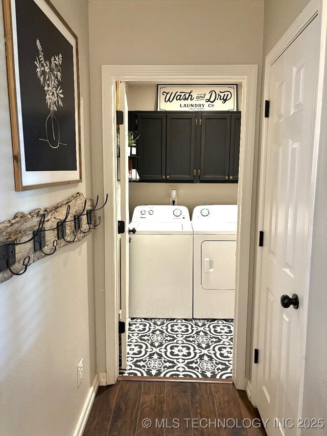 417292 E 1145th Rd, Eufaula, OK 74432 - laundry room with cabinet space, washing machine and clothes dryer, and dark wood-style flooring