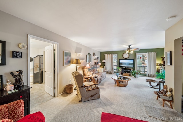 2219 Hart Cove Dr, Grove, OK 74344 - carpeted living area with a ceiling fan