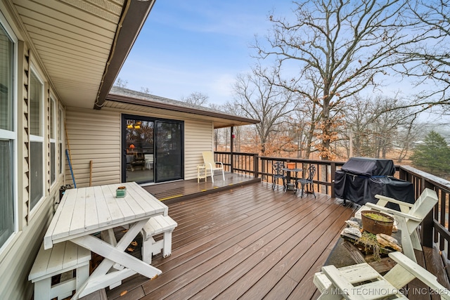 2219 Hart Cove Dr, Grove, OK 74344 - wooden terrace with outdoor dining space and a grill