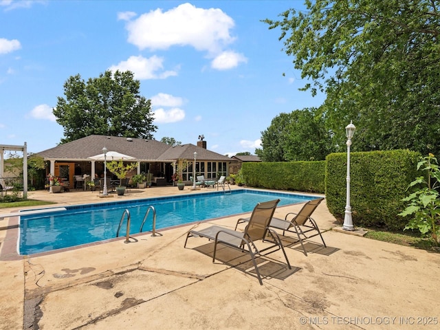 105 Quail Creek Ln, Skiatook, OK 74070 - view of swimming pool with a patio