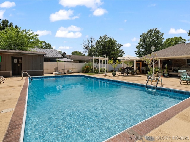 105 Quail Creek Ln, Skiatook, OK 74070 - view of swimming pool featuring outdoor dining area, a patio area, and a wooden deck