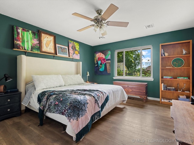 105 Quail Creek Ln, Skiatook, OK 74070 - bedroom with wood finished floors and ceiling fan