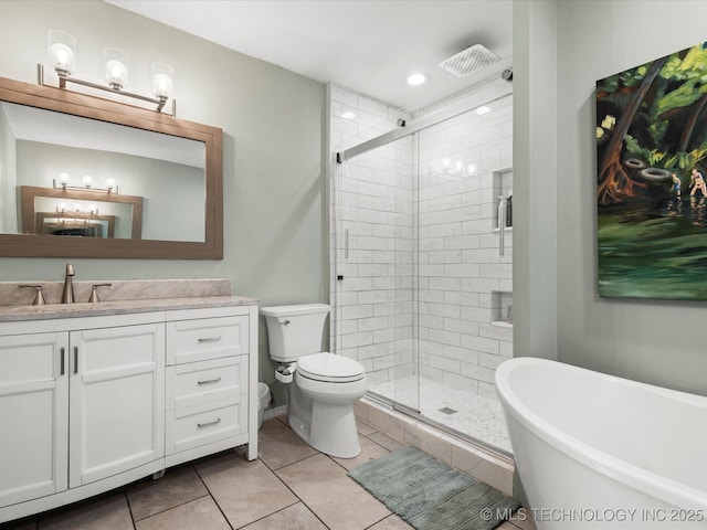 105 Quail Creek Ln, Skiatook, OK 74070 - full bath featuring a stall shower, vanity, a freestanding tub, tile patterned flooring, and recessed lighting