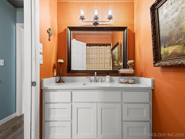 105 Quail Creek Ln, Skiatook, OK 74070 - bathroom with vanity and wood finished floors