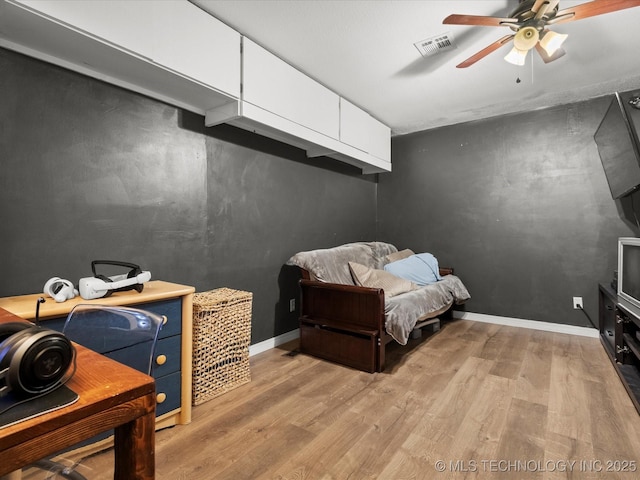 105 Quail Creek Ln, Skiatook, OK 74070 - bedroom with light wood finished floors and ceiling fan