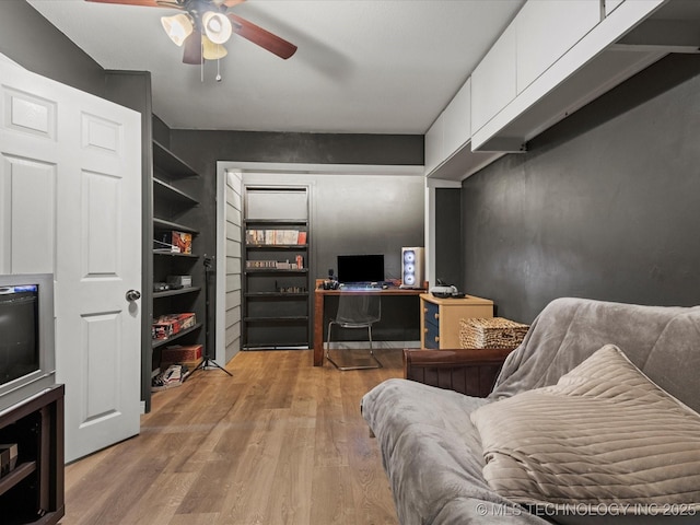 105 Quail Creek Ln, Skiatook, OK 74070 - office area with a ceiling fan, light wood-style floors, and built in shelves