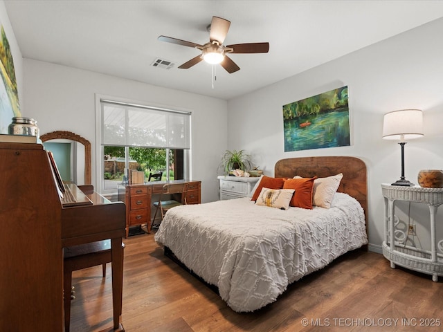 105 Quail Creek Ln, Skiatook, OK 74070 - bedroom featuring wood finished floors and ceiling fan