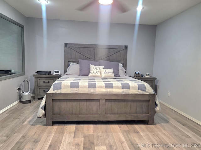 76654 S 4695, Stilwell, OK 74960 - bedroom with light wood-style flooring and a ceiling fan