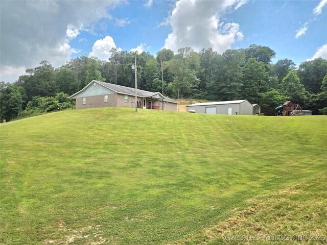 76654 S 4695, Stilwell, OK 74960 - view of grassy yard with an outdoor structure and a detached garage