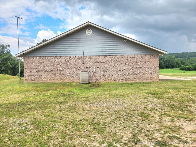 76654 S 4695, Stilwell, OK 74960 - view of side of property featuring a yard and brick siding