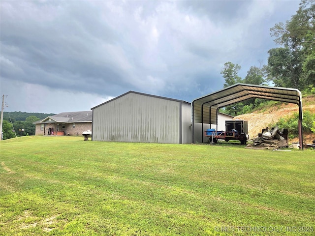 76654 S 4695, Stilwell, OK 74960 - view of outbuilding with a carport