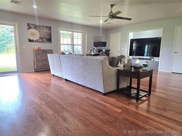 76654 S 4695, Stilwell, OK 74960 - living area featuring wood finished floors and ceiling fan