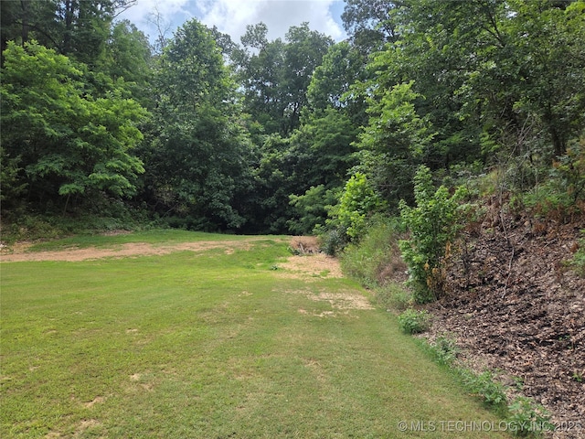 76654 S 4695, Stilwell, OK 74960 - view of grassy yard with a view of trees
