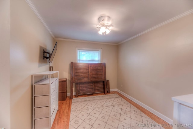 8109 E 31st Pl, Tulsa, OK 74145 - bedroom with light wood-style flooring and ornamental molding