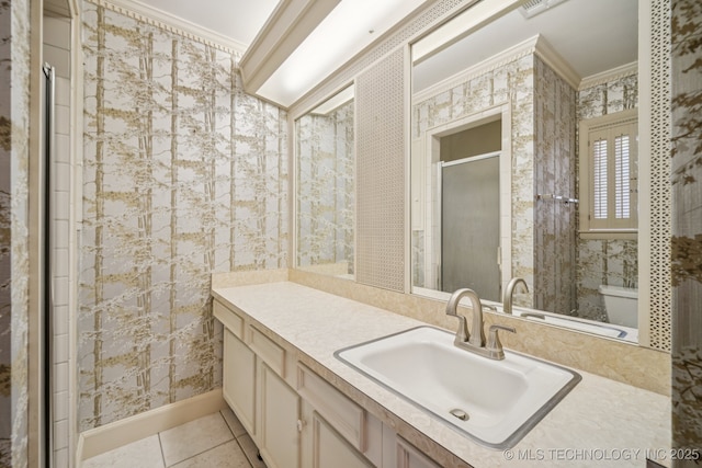 1234 S 101st E Ave, Tulsa, OK 74128 - bathroom featuring ornamental molding, vanity, tile patterned floors, a shower with door, and wallpapered walls