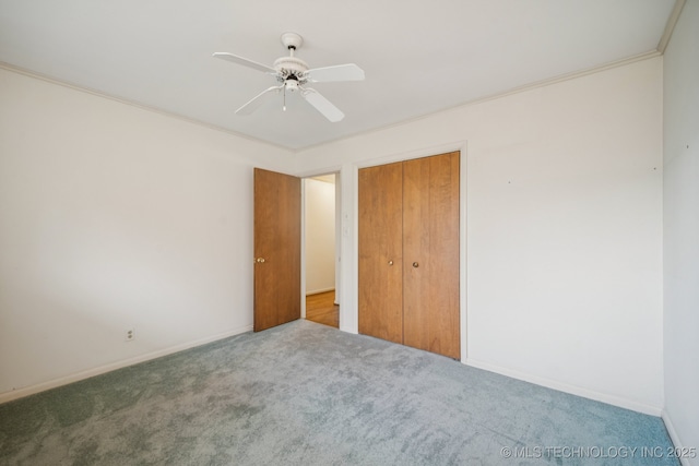 1234 S 101st E Ave, Tulsa, OK 74128 - unfurnished bedroom featuring carpet, a closet, and ceiling fan