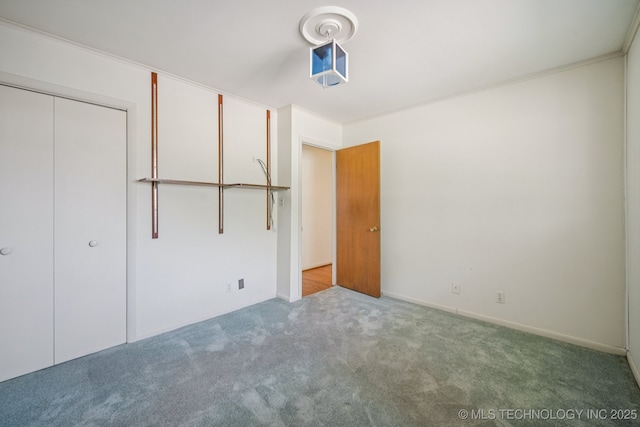 1234 S 101st E Ave, Tulsa, OK 74128 - unfurnished bedroom featuring carpet and a closet