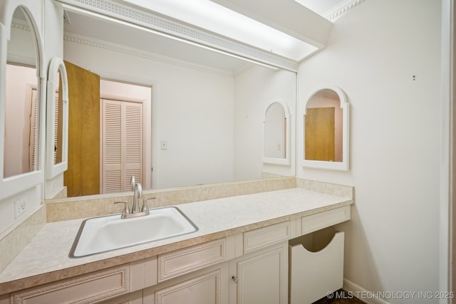 1234 S 101st E Ave, Tulsa, OK 74128 - bathroom with vanity and ornamental molding