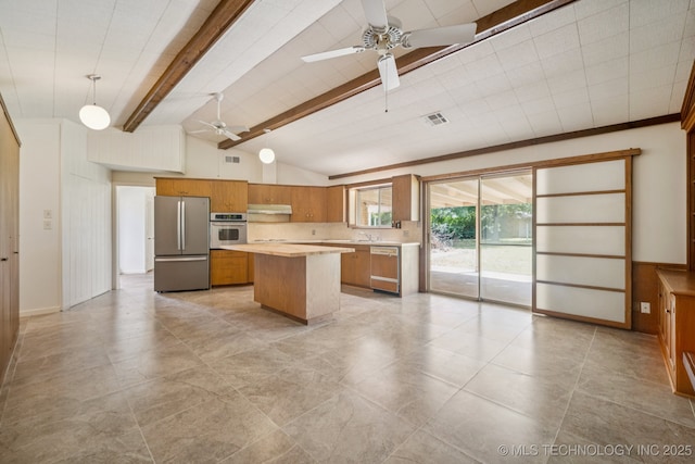 1234 S 101st E Ave, Tulsa, OK 74128 - kitchen featuring stainless steel appliances, ceiling fan, brown cabinets, light countertops, and a kitchen island