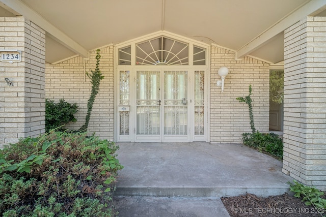 1234 S 101st E Ave, Tulsa, OK 74128 - view of exterior entry with brick siding and covered porch