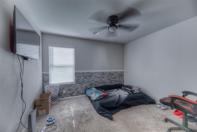 3711 S 151st E Ave, Tulsa, OK 74134 - unfurnished bedroom with carpet, a ceiling fan, and a wainscoted wall
