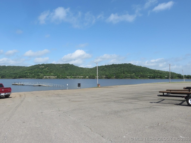 504 Blocker Rd, Mcalester, OK 74501 - water view with a forest