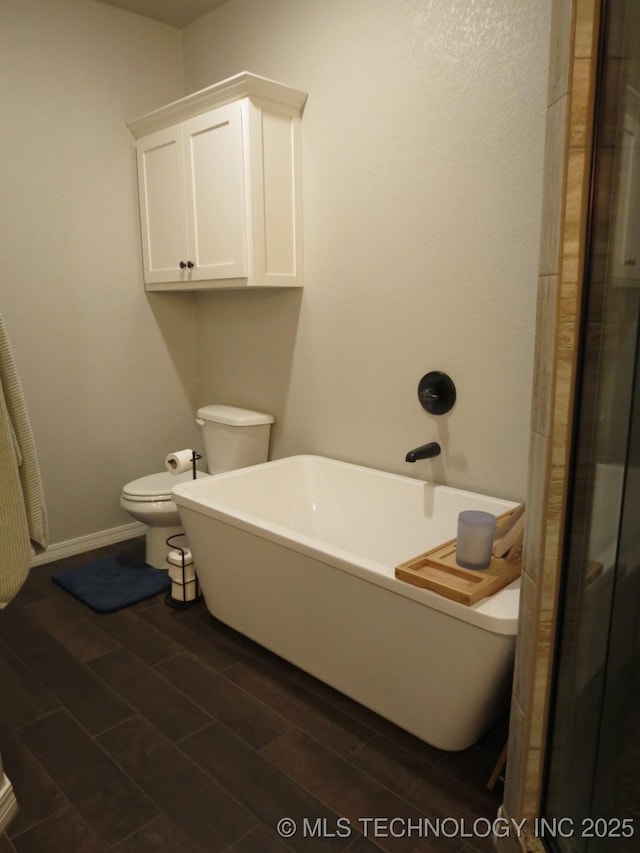 504 Blocker Rd, Mcalester, OK 74501 - bathroom featuring a soaking tub, wood finish floors, and a shower with door