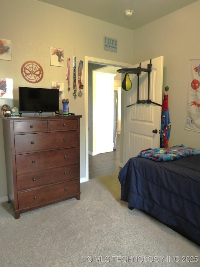 504 Blocker Rd, Mcalester, OK 74501 - carpeted bedroom with baseboards