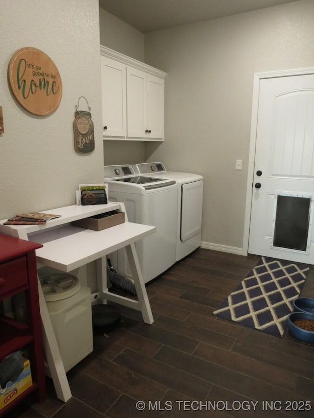 504 Blocker Rd, Mcalester, OK 74501 - laundry area featuring washer and clothes dryer, dark wood-type flooring, and cabinet space