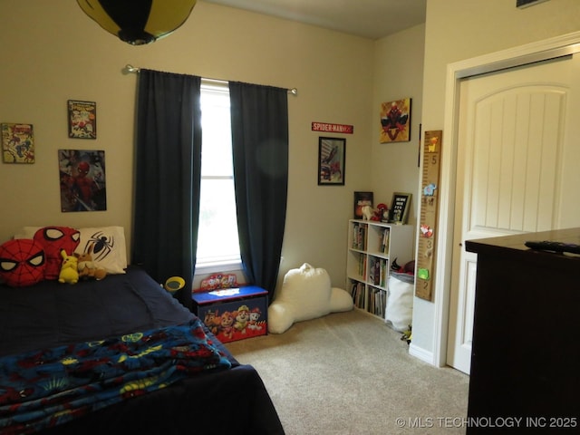 504 Blocker Rd, Mcalester, OK 74501 - carpeted bedroom with multiple windows