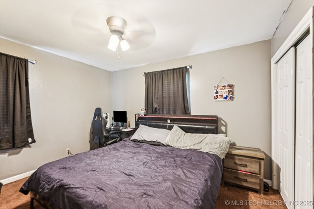 2548 Tull Pl, Muskogee, OK 74403 - carpeted bedroom with a closet and ceiling fan
