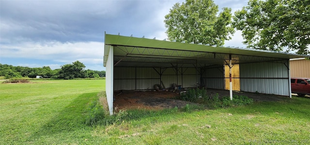 14505 S 145th E Ave, Bixby, OK 74008 - view of pole building with a lawn and a carport